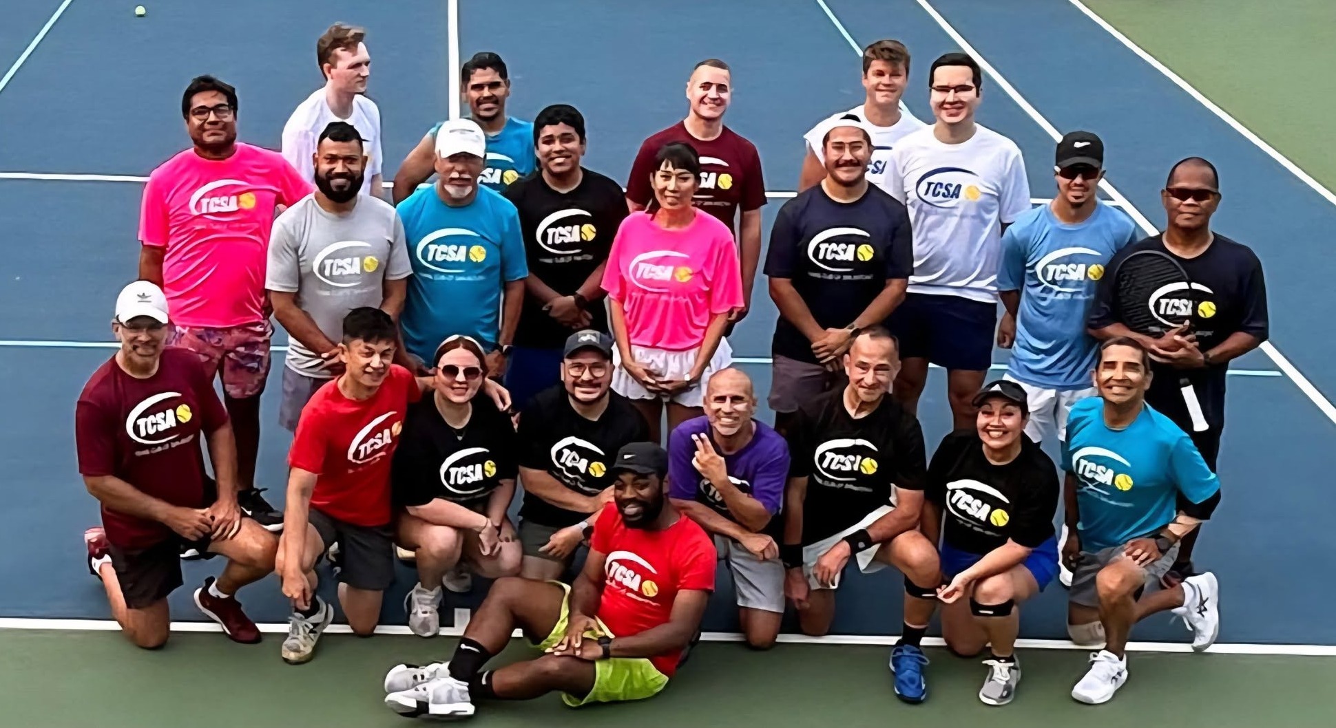 TCSA members gathered together on a tennis court